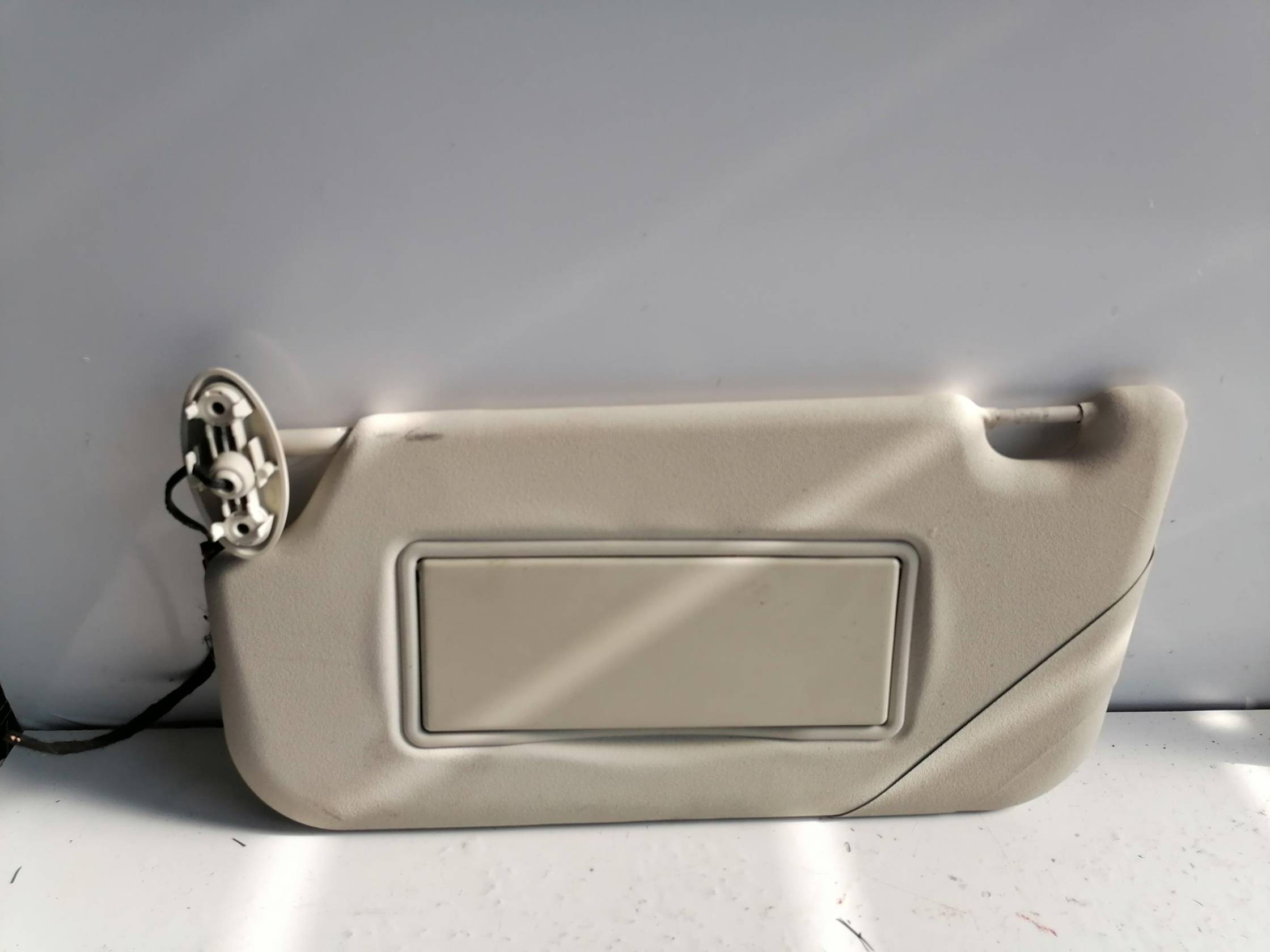 Aletta parasole parabrezza sx.